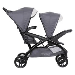 Baby Trend Sit N' Stand Double Stroller 2.0 DLX With 5 Point Safety Harness, Canopy, Extra Basket, 2 Cup Holders & Covered Compartment, Magnolia