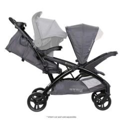 Baby Trend Sit N' Stand Double Stroller 2.0 DLX With 5 Point Safety Harness, Canopy, Extra Basket, 2 Cup Holders & Covered Compartment, Magnolia 9 Baby Trend Sit N' Stand Double Stroller 2.0 DLX With 5 Point Safety Harness, Canopy, Extra Basket, 2 Cup Holders & Covered Compartment, Magnolia -Baby Furniture Store GUEST dc7a7eda 1fdb 4f49 ba5d cad053e94f2e